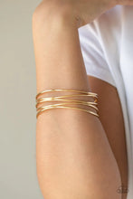 Load image into Gallery viewer, Showstopping Sheen Gold Bangle Bracelet Paparazzi Accessories