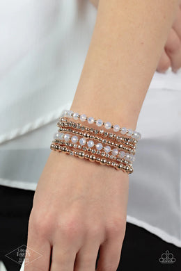 ICE Knowing You Rose Gold Rhinestone Coil Bracelet Paparazzi Accessories