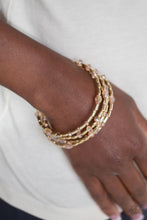 Load image into Gallery viewer, Regal Remix Gold Bracelet Paparazzi Accessories