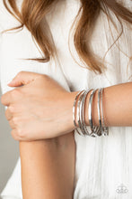 Load image into Gallery viewer, Top Of The Heap - Silver Bangle Bracelet Paparazzi Accessories