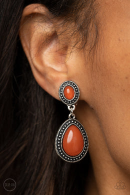 Carefree Clairvoyance - Orange Clip-On Earrings Paparazzi Accessories