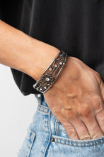 Load image into Gallery viewer, Prairie Musical - White Floral Hinge Bracelet Paparazzi Accessories